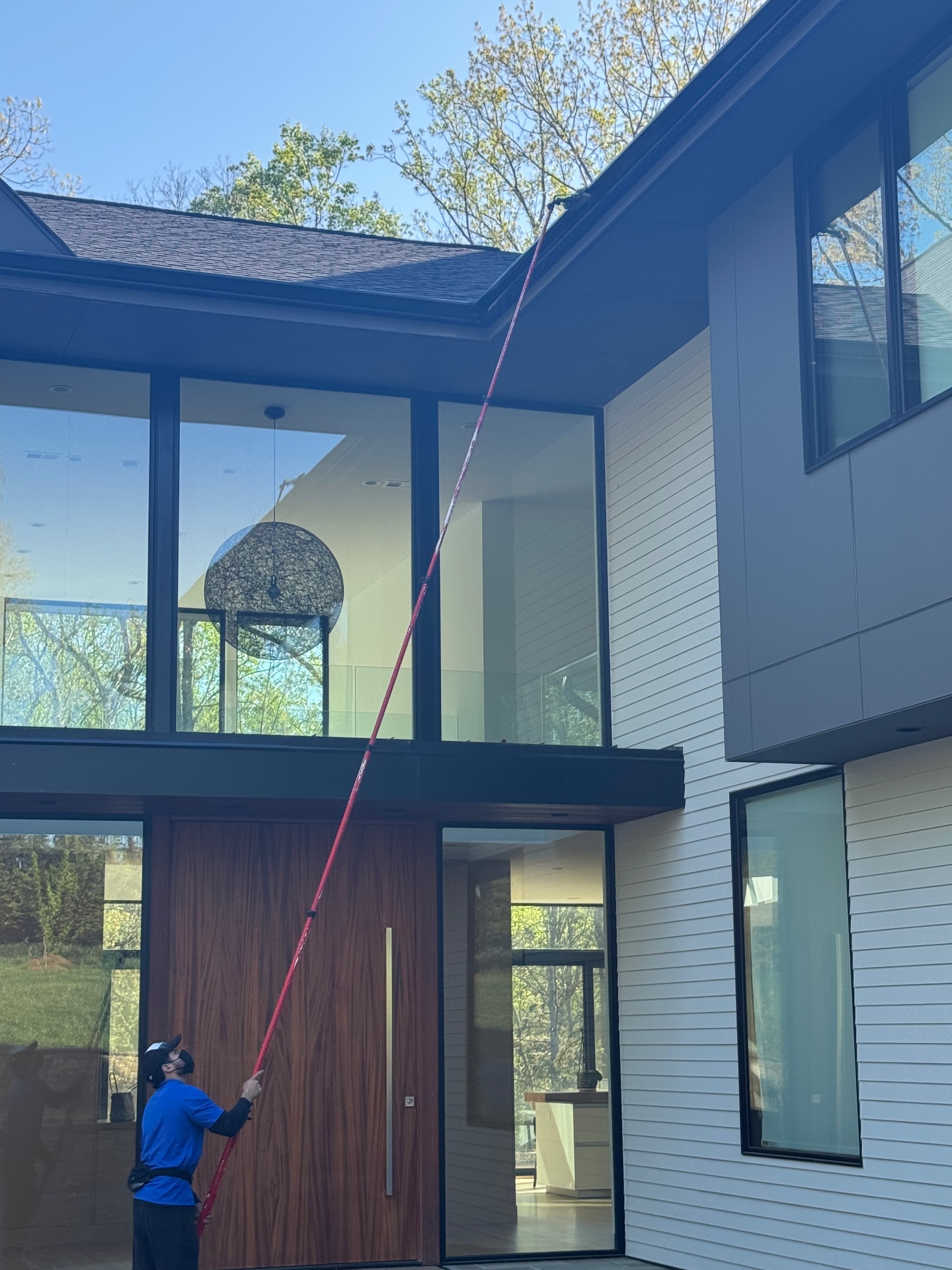 Two-story glass foyer cleaned inside and out